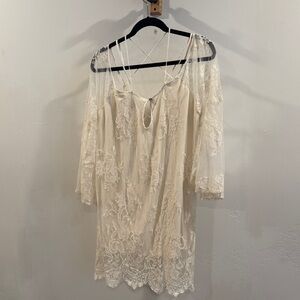 Jen’s Pirate Booty. Elegant mini Lace Dress with Sheer Sleeves size M